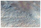 Scarp Exposing Bedrock
