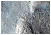 Dipping Layers in Depressions in Deuteronilus Mensae