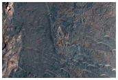 Light-Toned Materials Exposed along Noctis Labyrinthus Floor
