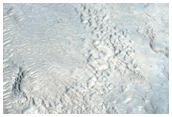 Thin Layers in Eroded Crater Southwest of Bamberg Crater
