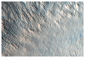 Crater in Outflow Bed in Tempe Terra
