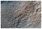 Impact Crater Exposing Bedrock
