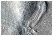 Dipping Layers along Mesas in Ismeniae Fossae
