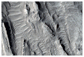 Possible Layering in a Depression in Northern Arabia Terra

