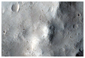 Pits in Well-Preserved Northern Mid-Latitude Crater
