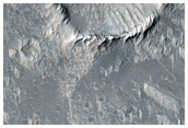 Lava Flows and Pit in Daedalia Planum
