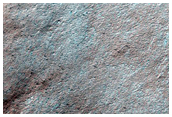 Spot Development Influenced by Underlying Terrain in Crater