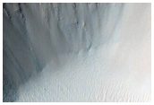 Crater in Ladon Valles Basin
