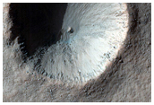 Crater Near Aonia Terra  
