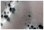 Intracrater Dune Field and Associated Extra-crater Dark Streak
