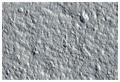 Rubicon Valles on Northwest Alba Mons in Mariner 9 DAS 7039903 and 8299139

