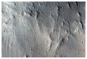 Valley Cut across Northern Lycus Sulci
