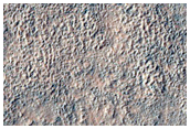 Sharply Stratified Wind Eroded Crater Fill Deposit
