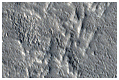 Channel in Crater Ejecta in Acheron Fossae Region
