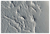 Lava Flow and Crater Ejecta in Northwest Tharsis Region
