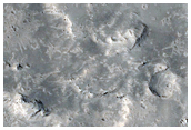 Layers Exposed in Depression in Aeolis Planum
