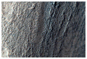 Layers in Mesa Wall in Centauri Montes Region
