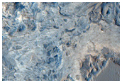 Mottled Deposit in Crater in Arabia Region
