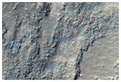 Aqueously Altered Sediments in Hellas Planitia
