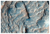 Light-Toned Material Filling Exhumed Crater
