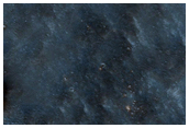 Curved Channel along Lava Flow Margin in Solis Planum
