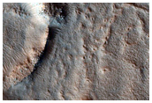 Cracks Forming Pitted Terrain in Deuteronilus Mensae