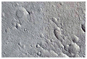 Layered Materials in Crater in Arabia Region