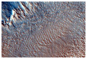 Dipping Layers along Wall of Flat-Floored Valley in Northern Mid-Latitudes