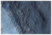 Layered Deposit in Crater in Hellas Montes Region