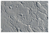 Pair of Oblong Depressions in Ceraunius Fossae