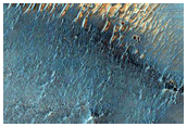 Stratigraphy Exposed in Crater Wall