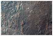 Possible Bedrock Exposure within Overlapping Crater Rim in Noachis Terra