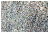 Scalloped Terrain in Mid-Latitude Mantle at Peneus Patera
