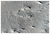 Layers in Meridiani Planum Under Crater Ejecta
