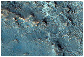 Light Arcuate Deposit on Crater Floor
