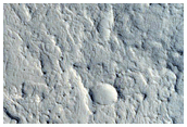Layered Mesa in Tikhonravov Crater
