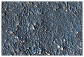 Eroded Rim Shared by Two Craters
