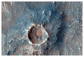 Inverted Channel in Larger Valley in Terra Sirenum
