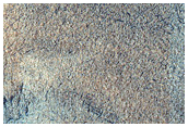 West Malea Planum Terrain
