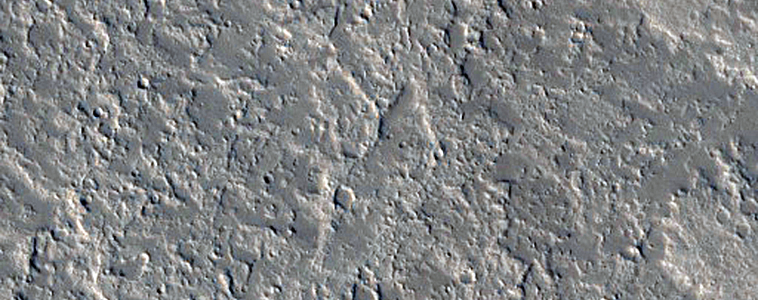 Cones and Channels East of Olympus Mons
