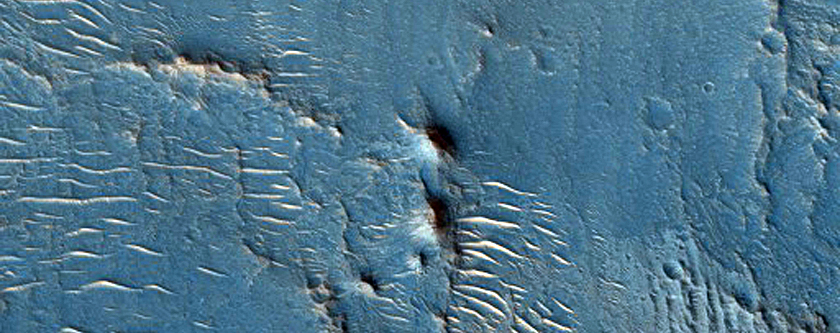 Light Toned Layered Material in Crater in Cydonia Mensae
