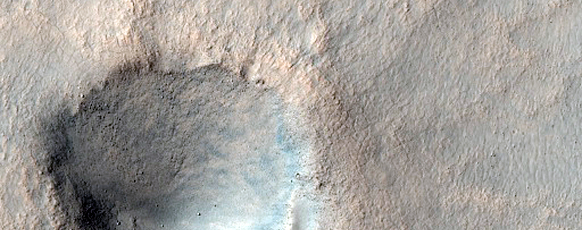Crater with Thin Ejecta Southeast of Icaria Planum
