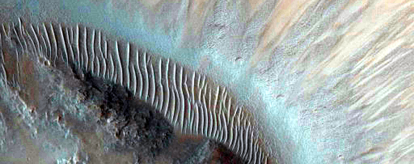 Well-Preserved 4-Kilometer Impact Crater North of Hellas Planitia
