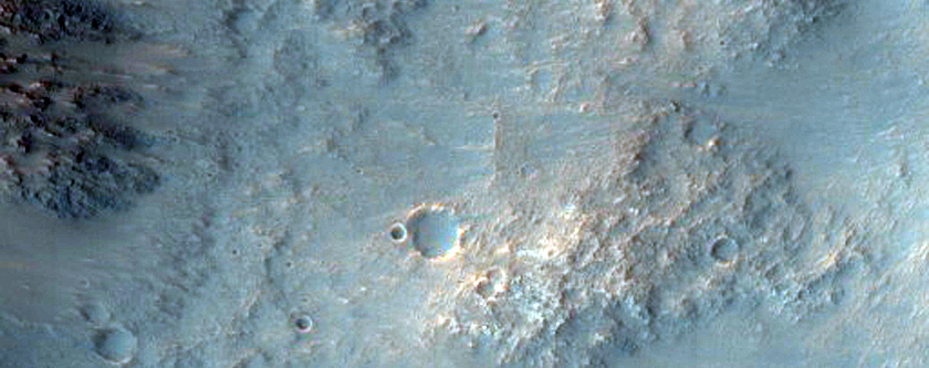 Crater Wall with Flow Lineae in Terrain North of Morava Valles