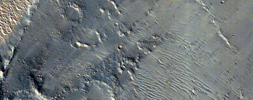 Tilted Layers on Crater Floor
