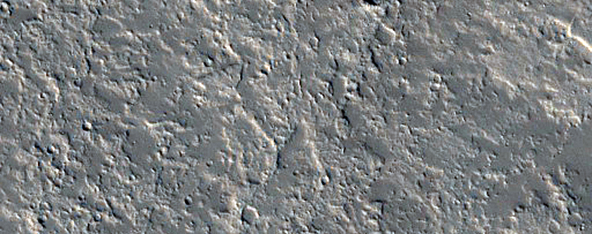 Cones and Channels East of Olympus Mons