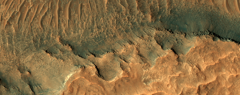 Monitor Slopes Northwest of Hellas Planitia
