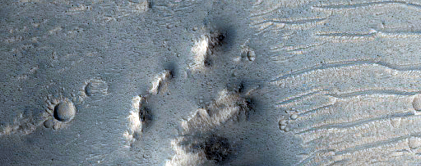 Phyllosilicates in Crater Near Valles Marineris
