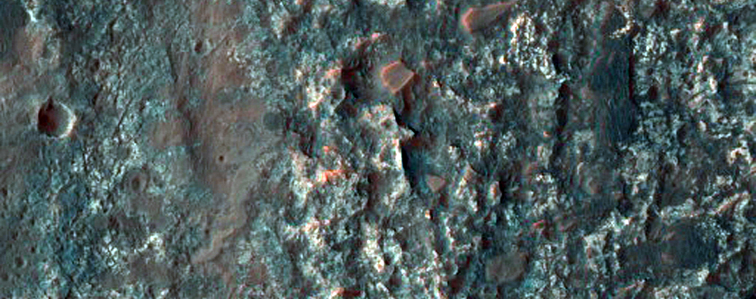 Crater Remnant on Floor of Ladon Valles Basin
