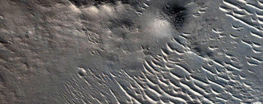 Rocky Impact Crater with Central Peak
